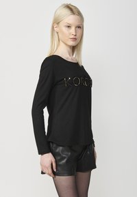 Koroshi Hosszú ujjú felső - black