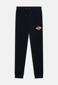 Pantalones de chándal negros hechos de tela suave con cintura ajustable con cordón. Presenta un logo en naranja y blanco en el muslo izquierdo.