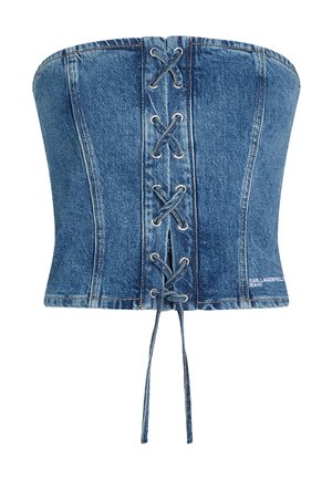Top bustier en denim bleu sans bretelles de style corset avec un laçage frontal et des coutures visibles, avec un petit logo de marque blanc sur le côté inférieur.