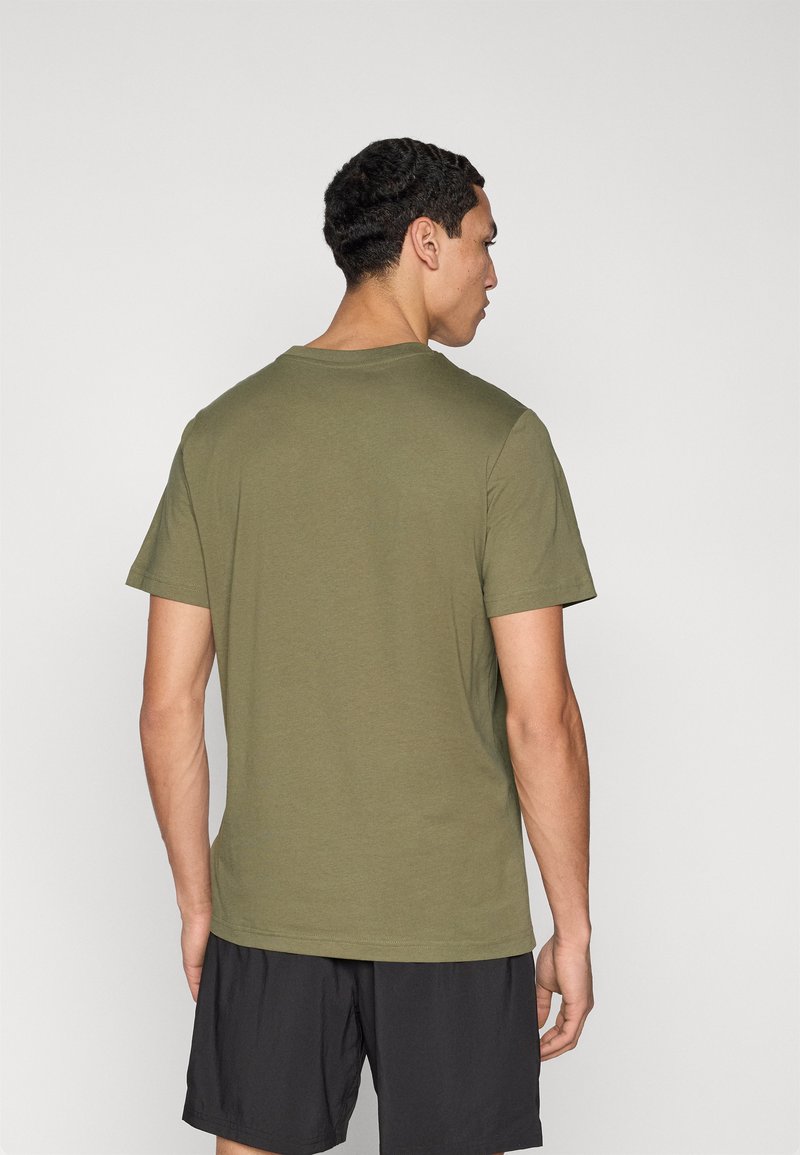 Puma SMALL LOGO TEE - Jednoduché tričko - loden green