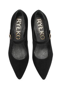 Black suede Mary Jane flats feature a pointed toe, a narrow strap with a gold-tone buckle, and a textured black insole.