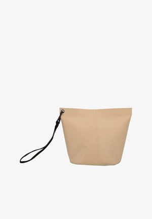 Borsetta in silicone beige con cinturino da polso nero rimovibile attaccato tramite un occhiello in metallo su sfondo bianco.