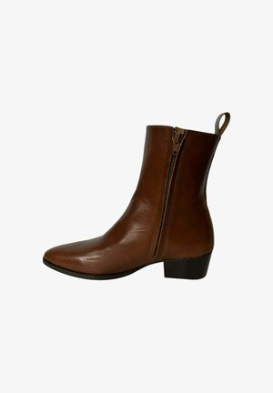 Brauner Leder-Stiefeletten mit seitlichem Reißverschluss, niedrigem Blockabsatz und Zuglasche hinten.