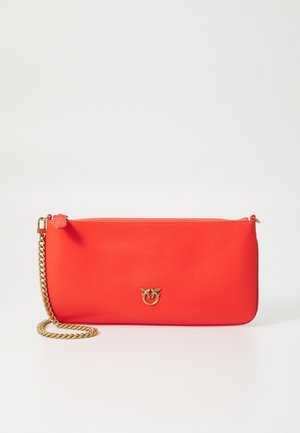 Red synthetic pouch with a gold chain strap and a logo detail on the front. Rectangular shape with a zip closure and smooth texture.