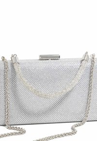 Silver rectangular clutch handbag covered in small rhinestones with a curved rhinestone handle and silver chain strap on white background.