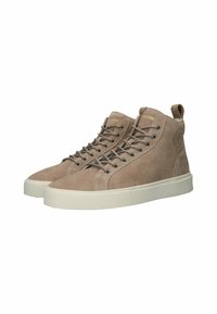 Mid-top sneakers lavet af beige sv suede med en tekstureret overflade, der har grå snørebånd, en hvid gummi sål og en logo detalje på siden.