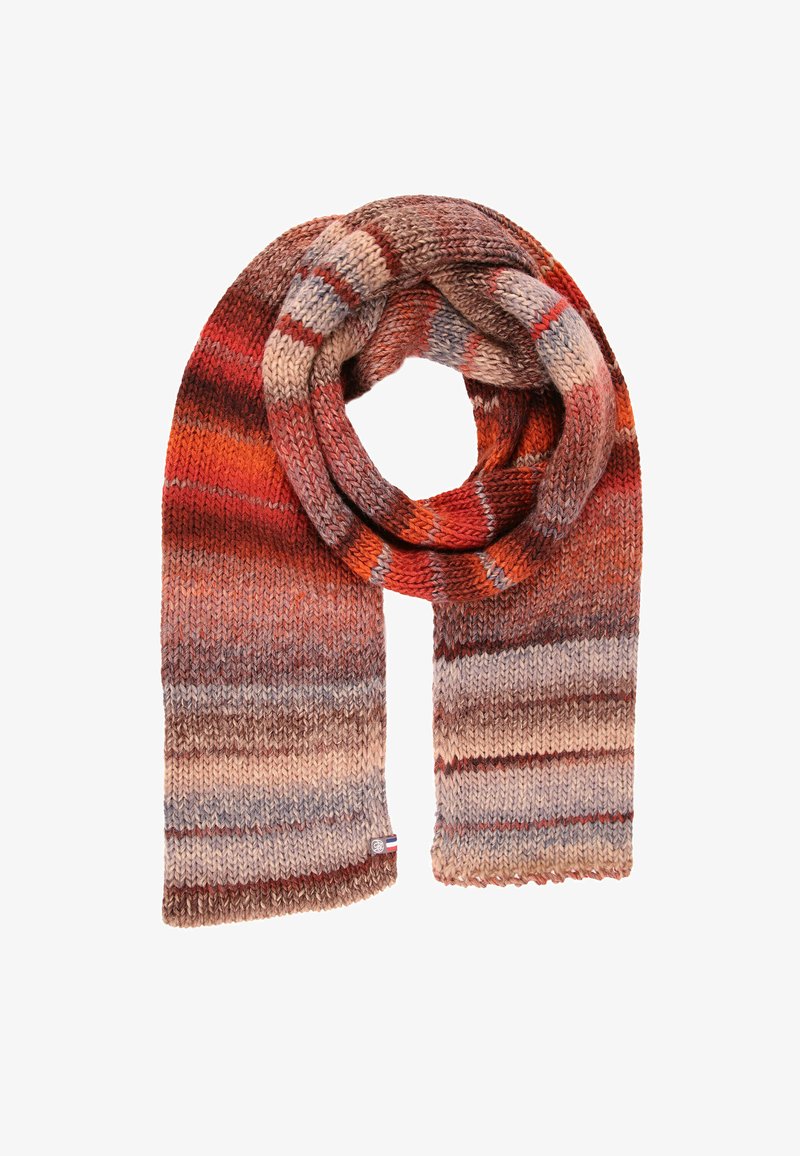 Écharpe en tricot dans des tons chauds de rouge, orange et marron, présentant un motif texturé avec des changements de couleur progressifs et une étiquette de marque à l'extrémité.