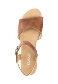 Braune Ledersandale mit zwei breiten Riemen, einem Knöchelverschluss und einer gepolsterten Innensohle. Verfügt über eine strukturierte Fußbett und eine glatte Oberseite.