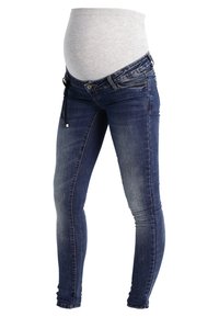 Äitiys skinny-farkut tummansinisestä denimistä, joissa on kulutuksia. Niissä on pehmeä harmaa joustava vyötärö ja kiristysnauha säätömahdollisuutta varten.
