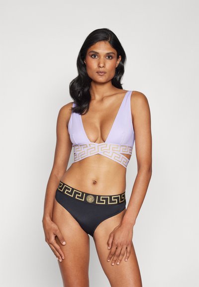 Purple bikini top with a plunging neckline and Greek key design, paired with black bottoms featuring a gold-accented waistband.
