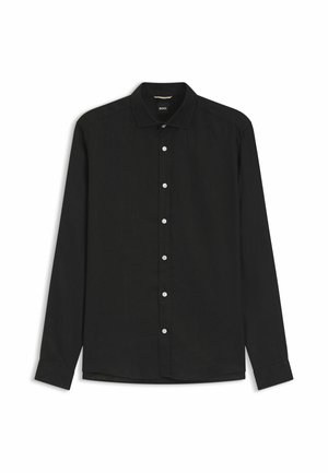 Chemise noire à manches longues boutonnée avec col et boutons blancs, présentée à plat sur un fond blanc.
