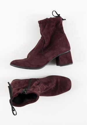 Bottines à talons hauts - red
