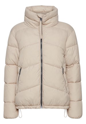Beige pufferjack met een hoge kraag, rits aan de voorkant en diagonale stiksels. Beschikt over twee ritszakken aan de zijkant. Glad oppervlak.