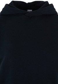 Felpa nera realizzata in tessuto morbido, dotata di tasca a marsupio, cappuccio regolabile con cordoncino e polsini a costine. Design semplice e di colore uniforme.