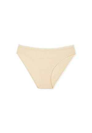 Sous-vêtement bikini en coton beige avec texture lisse, doté d'une ceinture avec couture décorative et d'un design à couverture modérée.