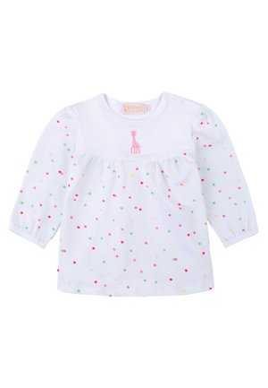 Maglietta bianca a maniche lunghe con scollo rotondo, vita arricciata e pois multicolori. Giraffa rosa ricamata vicino al colletto.