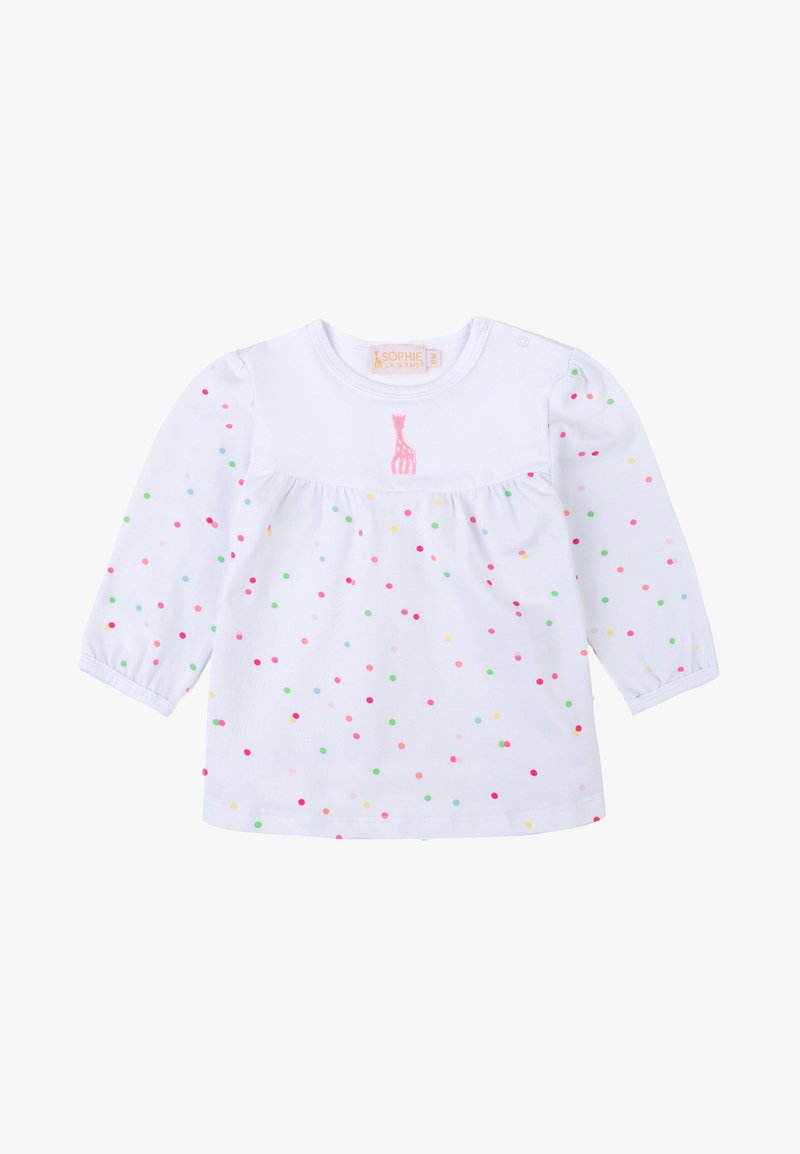 Maglietta bianca a maniche lunghe con scollo rotondo, vita arricciata e pois multicolori. Giraffa rosa ricamata vicino al colletto.