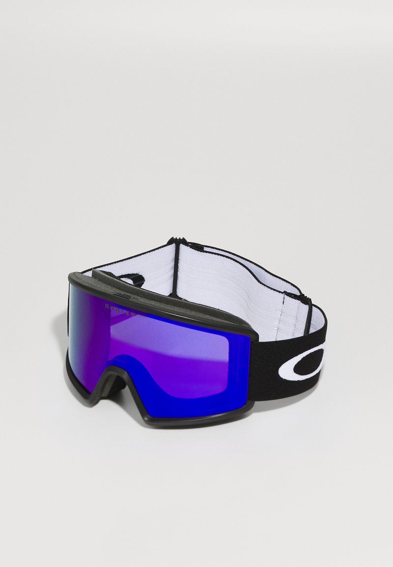 Lunettes de ski avec une sangle réglable noir et blanc, grandes lentilles teintées de violet et une monture noire élégante. Conçues pour une utilisation lors des sports d'hiver.