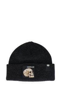 Black knit beanie with a textured pattern. Features a patch with a skull design and the word "CANCELLED" in white.