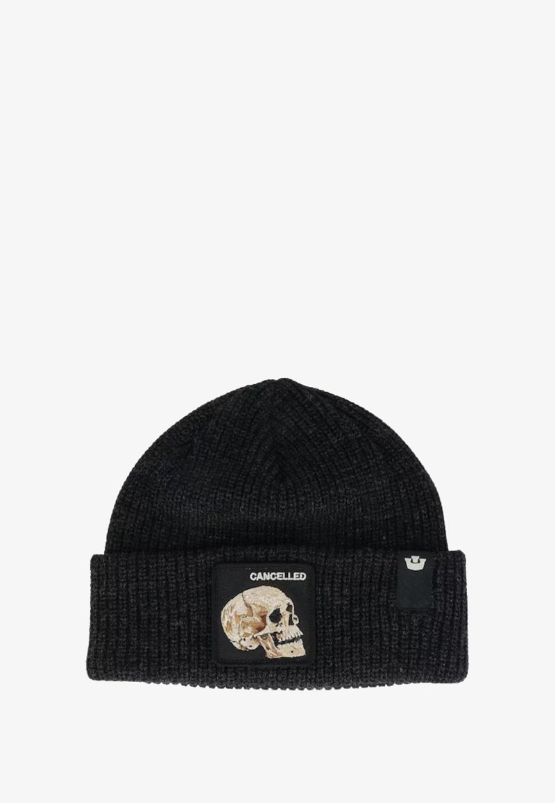 Black knit beanie with a textured pattern. Features a patch with a skull design and the word "CANCELLED" in white.