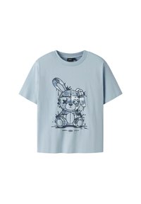 T-shirt di cotone blu chiaro con grafica di un coniglio cartoon caratterizzato da un design a motivi e effetti di schizzi. Maniche corte, scollo rotondo.