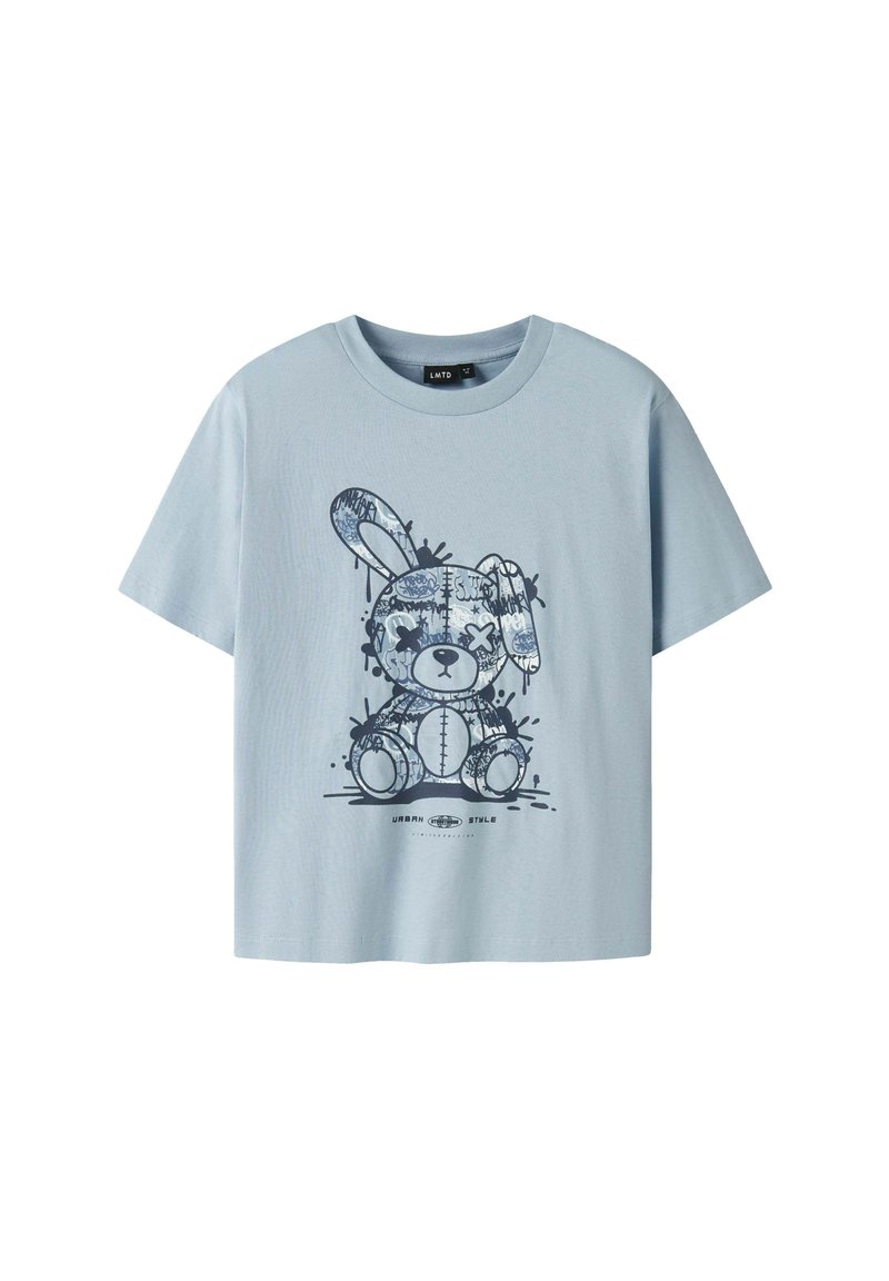 T-shirt di cotone blu chiaro con grafica di un coniglio cartoon caratterizzato da un design a motivi e effetti di schizzi. Maniche corte, scollo rotondo.