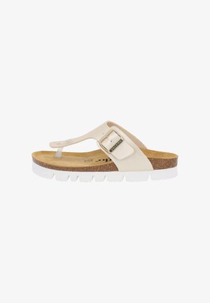 Beige tanga sandal med en spændeaccent, korkfodseng og hvid gummisål med tekstureret slidbane for bedre greb.