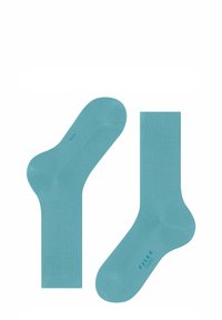 Turkusowe skarpetki bawełniane o gładkiej fakturze, wzmocnionym palcu i pięcie, ściągaczu oraz subtelnym logo na podeszwie.