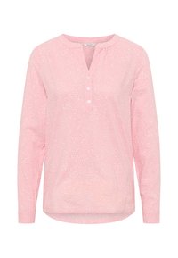 Langärmlige rosa Bluse mit kleinem weißen Punktmuster, Rundhalsausschnitt und drei weißen Knöpfen an der vorderen Blende.