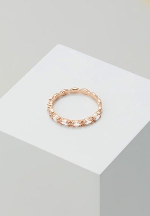 Rose gold ring with marquise-cut clear gemstones set in a continuous band, displayed on a white pedestal.