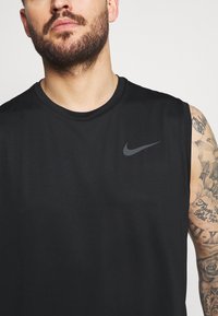 Nike Performance DRY TANK - Top - black/dark grey