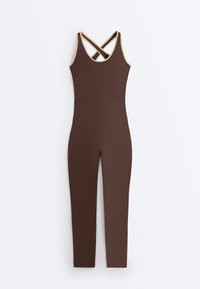 Brown sleeveless fitted jumpsuit with crisscross straps at the back and beige trim along the armholes and neckline.