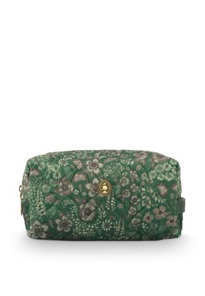 Quilted toiletry bag in green with floral pattern, featuring a gold-tone accent and zipper closure. Rectangular shape with soft texture.