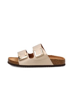 Sandalia beige abierta con dos tiras ajustables con hebillas metálicas cuadradas y plantilla de corcho con suela negra.