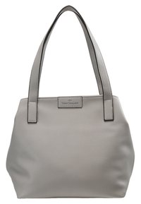 Sac tote en cuir gris avec deux poignées robustes et une texture lisse et douce. Présente une petite plaque logo à l'avant et une couture contrastante.