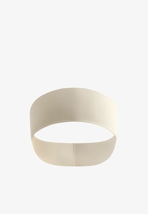 Weites beiges Stoff-Stirnband mit glatter Textur und ohne sichtbare Muster oder Logos.