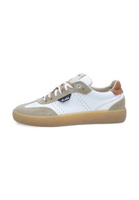 White sneaker with suede accents in beige and tan. Features perforated design, beige sole, and striped laces. Black logo on side.