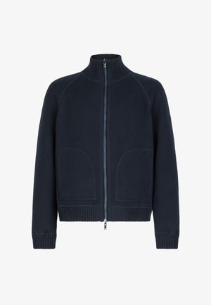 Ciemnogranatowy sweter na zamek z wysokim prążkowanym kołnierzem, prążkowanymi mankietami i krawędzią oraz dwoma przednimi kieszeniami z przeszyciami.