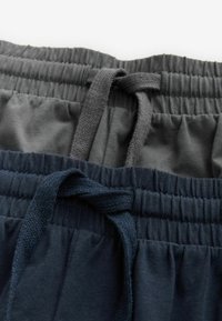 To sæt elastiske talje joggers i mørkegrå og navy, med struktureret stof og matchende snore til justering.