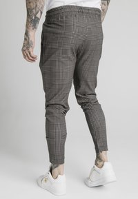 SIKSILK SMART JOGGER PANT - Housut - beige dogtooth
