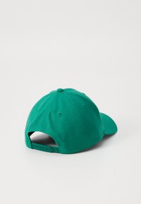 Grønn baseballcaps med strukturert krone, buet skjerm og justerbar plaststropp bak for god passform. Stofteksten er glatt.