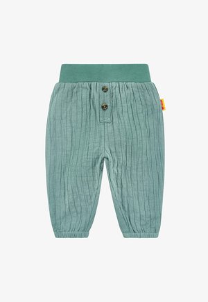 Weiche, strukturierte türkisblaue Kinderhose mit elastischem Bund, zwei dekorativen Knöpfen, elastischen Bündchen und einem kleinen gelben Markenzeichen an der Seite.