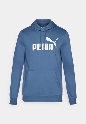 Blauwe katoenen hoodie met een voorste kangoeroezak, geribde mouwuiteinden en een groot wit "PUMA" logo met de silhouet van een poema.
