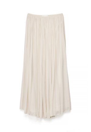 Long cream-colored pleated skirt with a flowy, lightweight fabric and an elastic waistband.