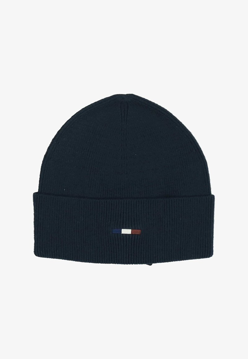 Navyblauwe geribbelde breimuts met omgeslagen rand en klein rechthoekig logo in blauw, wit en rood, gecentreerd op de rand.