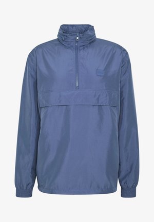 Tumed sinine kerge tuulejakki kõrge krae, poole tõmbega ees, elastsete mansettide ja horisontaalse rinda taskuga. Sile tekstuur.