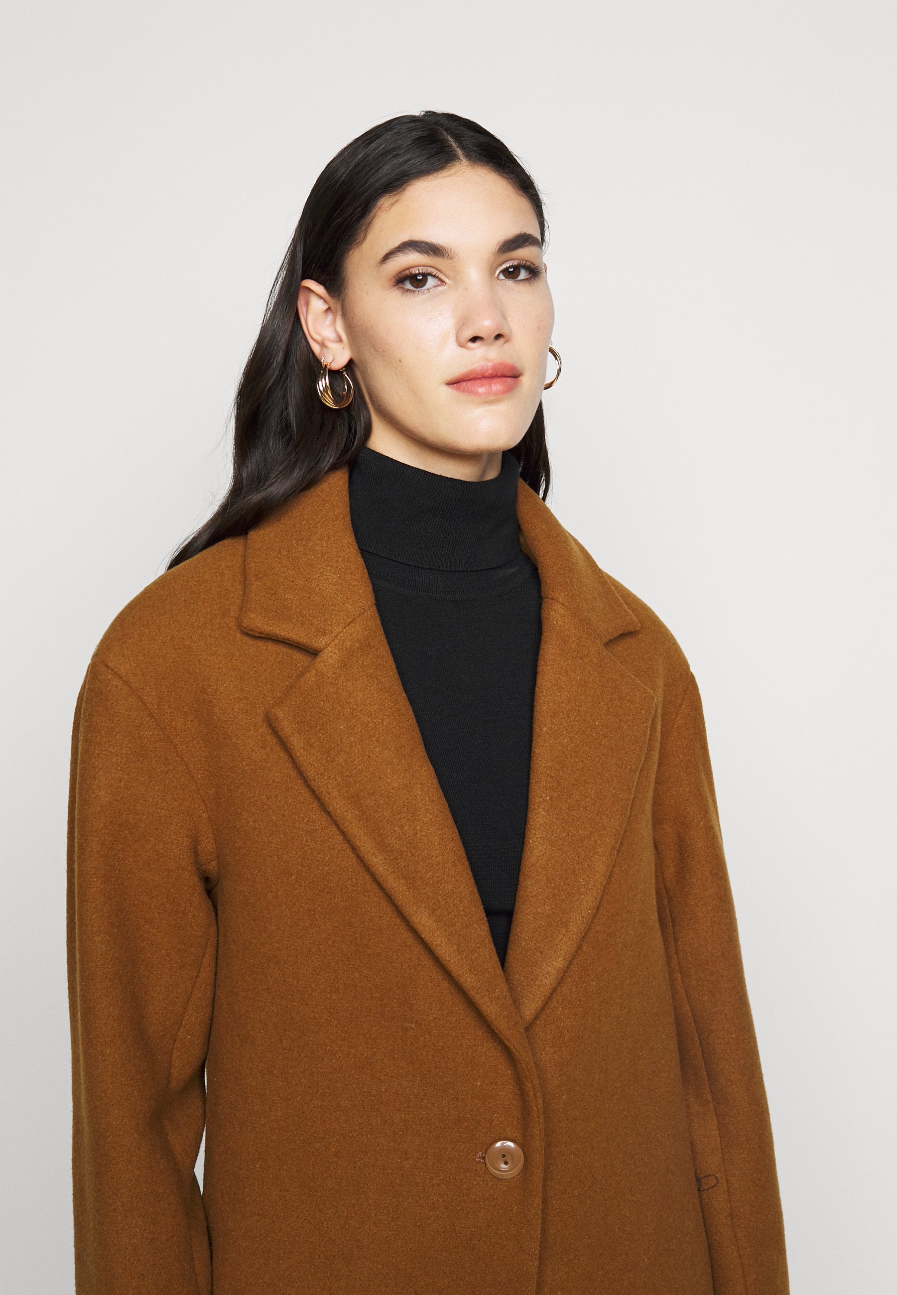 tall mustard coat