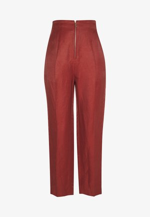 Pantaloni a vita alta di colore rosso ruggine, con zip frontale, vestibilità sartoriale e gamba dritta, realizzati in un tessuto testurizzato.