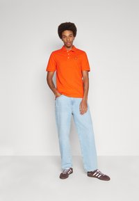 Lyle & Scott Polo - tangerine tango