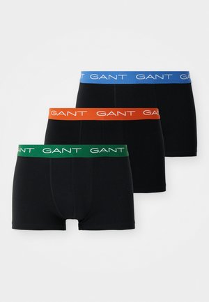 Trzy pary czarnych bokserów z kontrastującymi kolorowymi elastycznymi paskami: zielonym, pomarańczowym i niebieskim, z logo "GANT".
